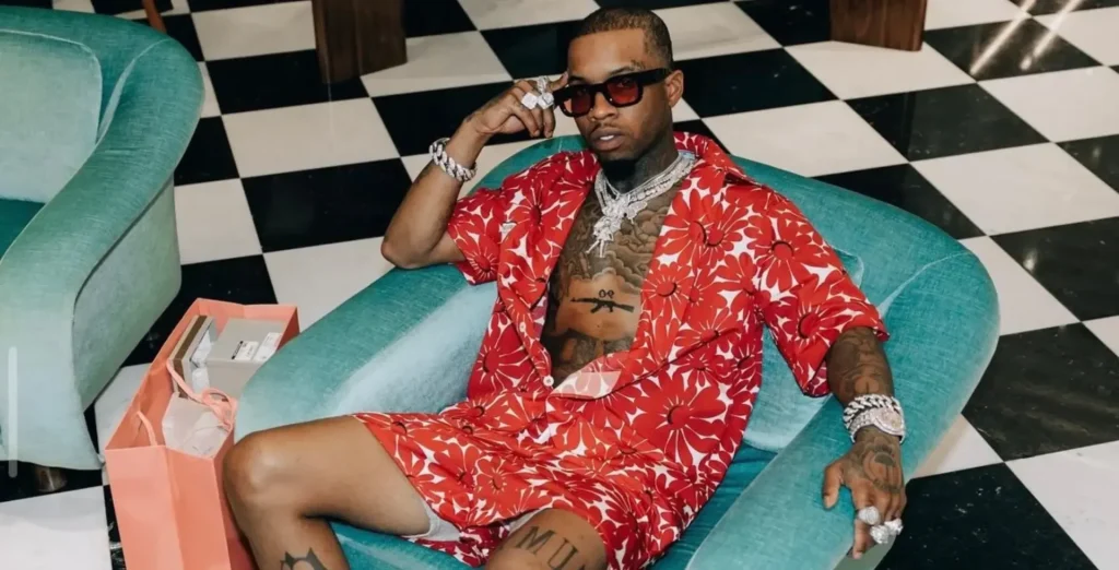 Tory Lanez sitting on a chair - Illustration photo of Fortune article Tory Lanez