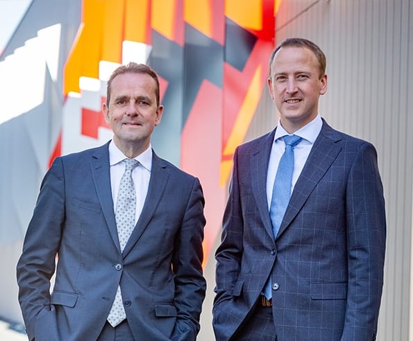 logo and representation of the managers of Thomas & Piron