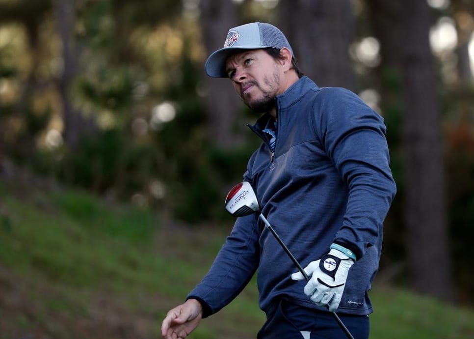 Mark Wahlberg with his golf equipment
