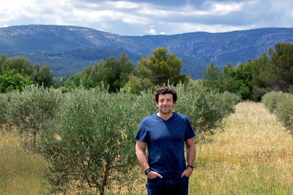 Patrick Bruel in front of his estate in Provence