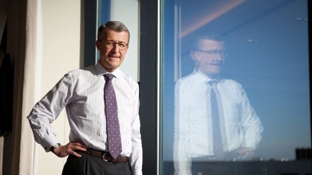 Filip Balcaen in front of a window and his real estate investment