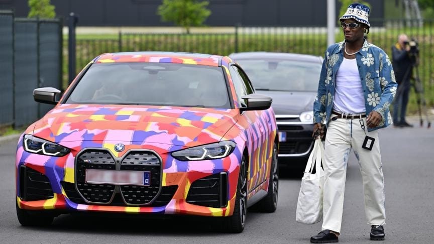 Romelu Lukaku in a luxury car