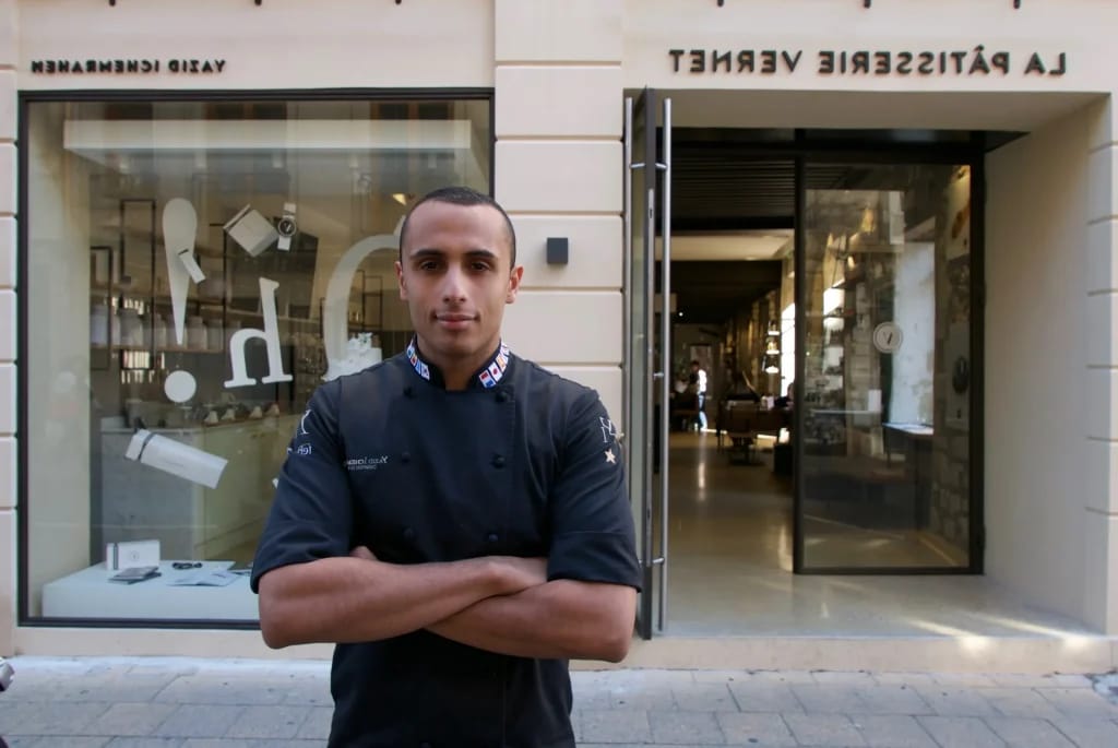 Yazid Ichemrahen in front of the VERNET patisserie - Illustration of the article Yazid Ichemrahen Fortune