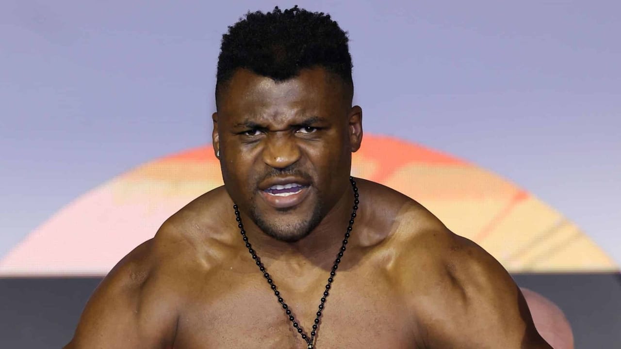 Francis Ngannou, iconic figure in combat sports and former UFC champion, ready to fight in the ring.