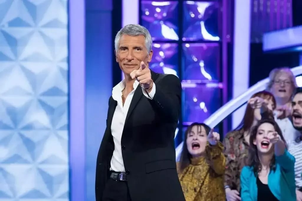 Nagui in N'oubliez pas les paroles - Illustrationsfoto des Artikels Vermögen Nagui