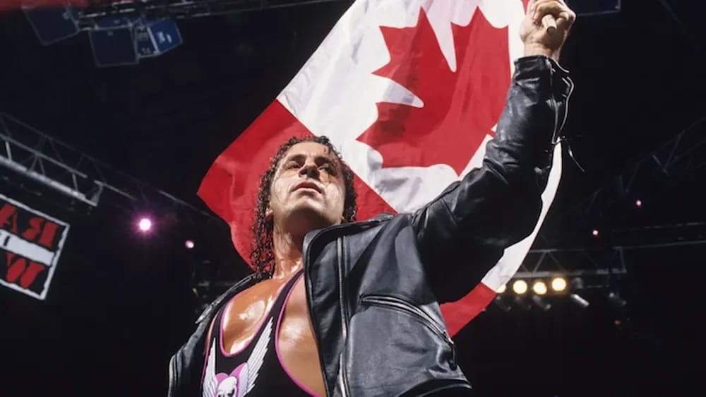 Bret Hart zwaait met de Canadese vlag - Illustratiefoto van het artikel Vermogen Bret Hart