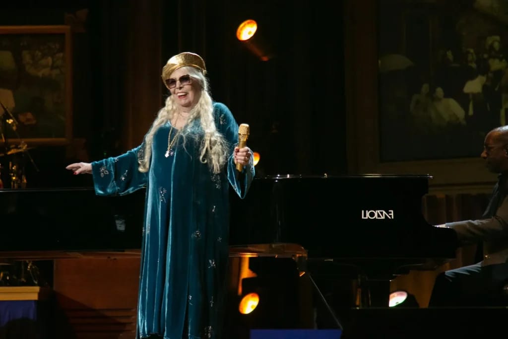 Joni Mitchell chantant sur scène - Photo d'illustration de l'article Fortune Joni Mitchell